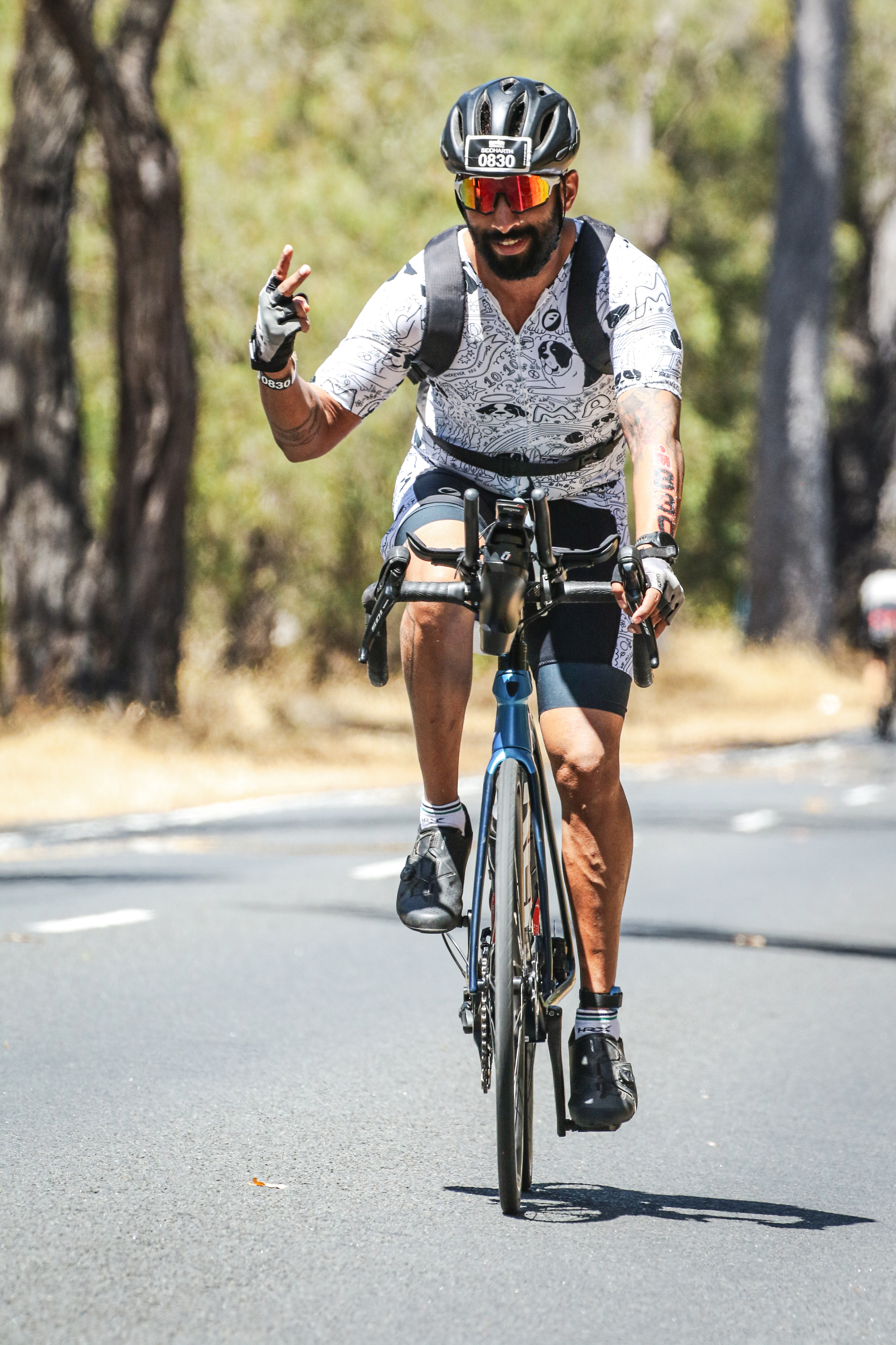 Siddharth Deshpande cycling during an Ironman race